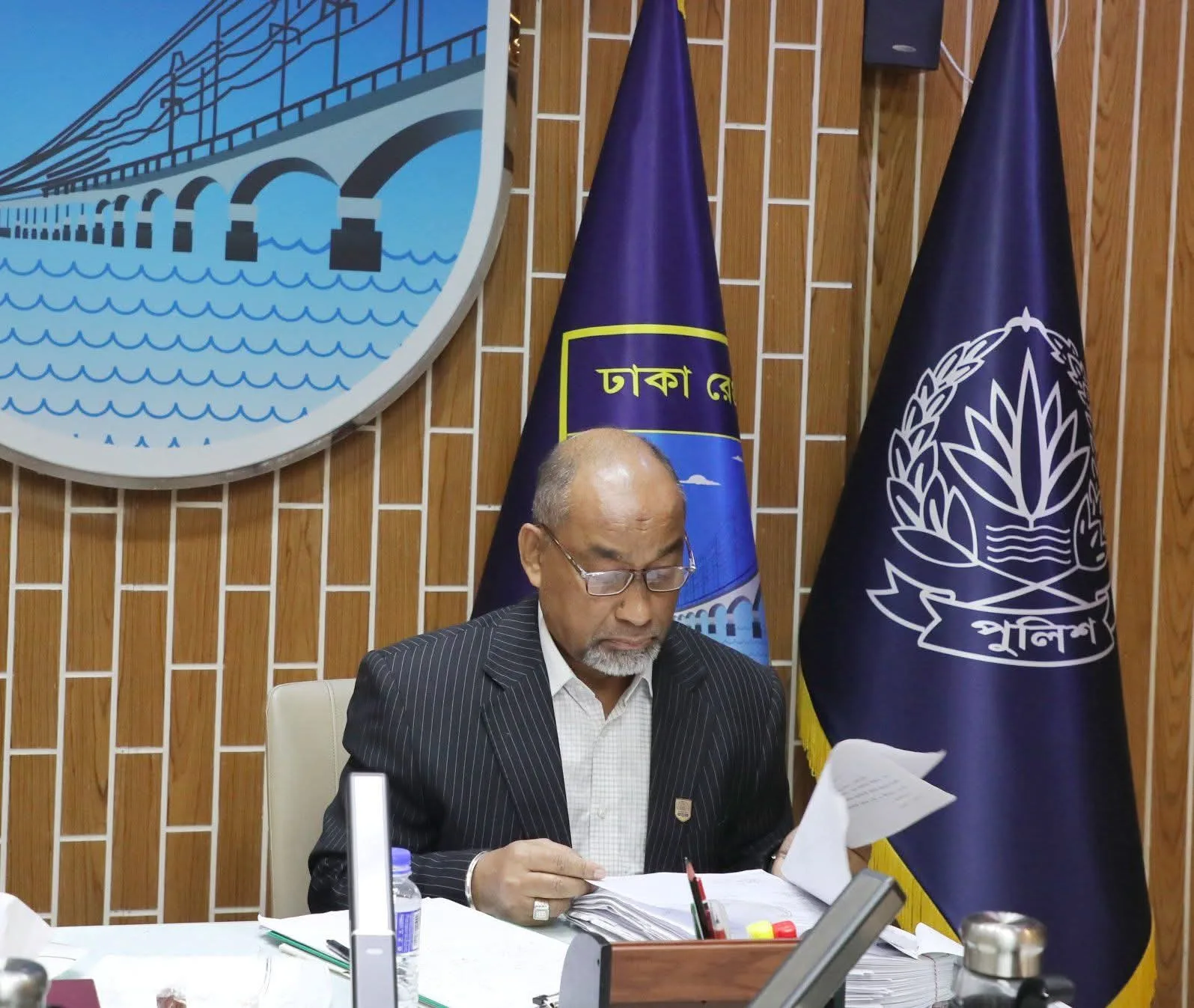 Ehsanul Haque Shomaji during official duties at Police Headquarters.